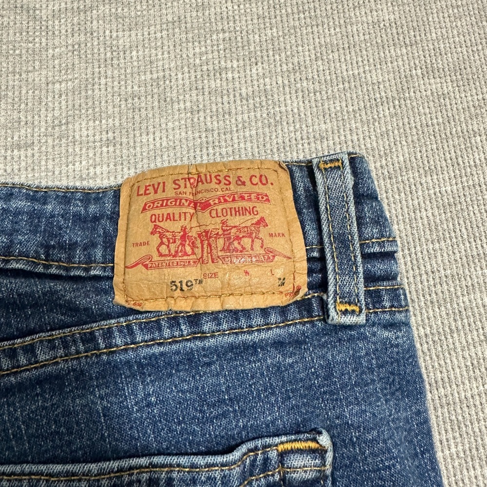 Levi's 519 Low Flare Jeans 13 JR Womens 32x31 Medium Wash Distressed Raw Hem Y2K - Picture 13 of 16